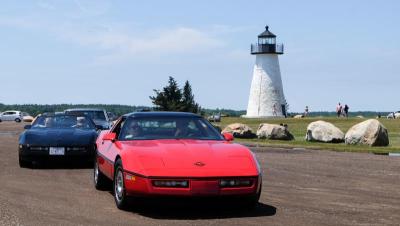 A couple of corvettes carved the turn out of the park.