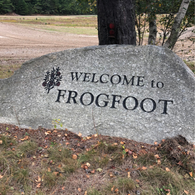 ‘Welcome to Frogfoot’ carved into a large rock at the entrance of the farm.
