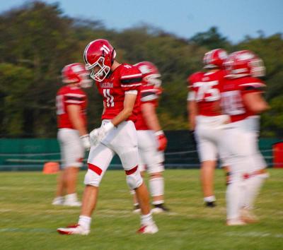 Henry Berry walks off from a play. Photos by Mari Huglin 