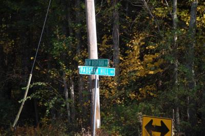 The boulder is located at the intersection of New Bedford Road and Vaughn Hill Road in Rochester. 