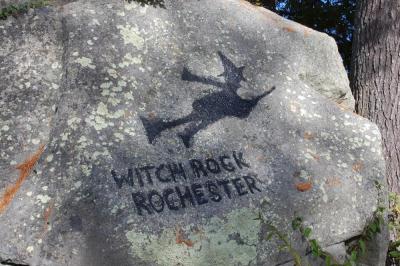 The text and image were originally painted by the owner of the property the rock sits on in 1990. Photos by Mari Huglin