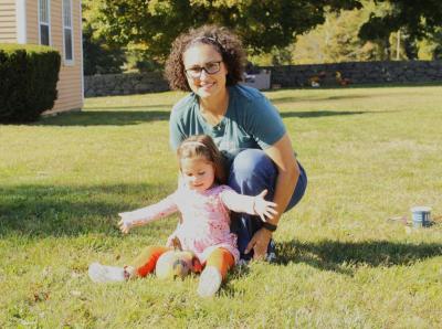 Marion residents Mandy Givens and Gemma Givens, 3, pose with a small pumpkin Gemma painted.