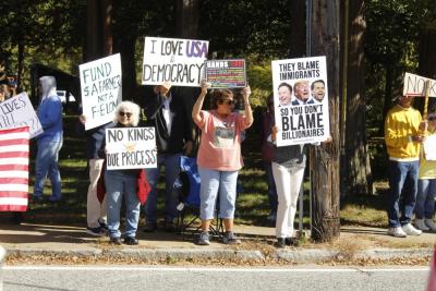 Protestors line up along North Street in Mattapoisett.