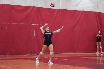 Freshman Aubrey Griffith serves. Freshman Aubrey Griffith serves.