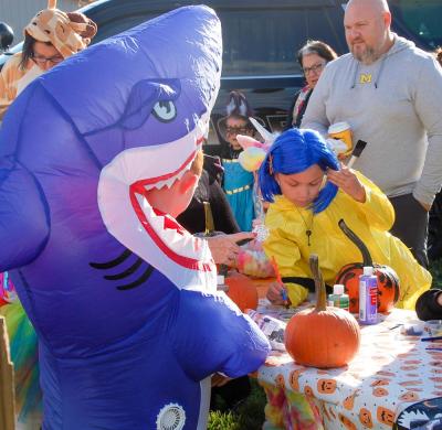 The pumpkin painting table was popular at the Marion trunk or treat. The pumpkin painting table was popular at the Marion trunk or treat.