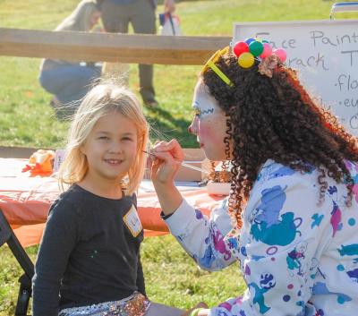 Lilly Bowser, age 5, gets her face painted. Lilly Bowser, age 5, gets her face painted.