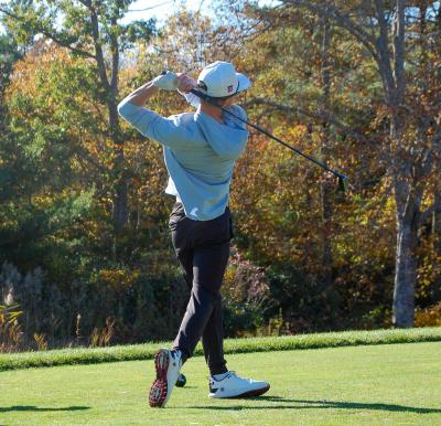 Brady Mills watches his ball go down the course.  Brady Mills watches his ball go down the course.