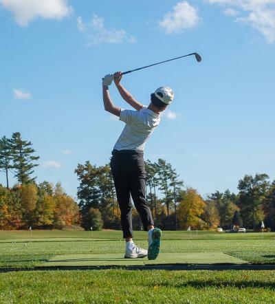 John Bongiorno watches the ball fly.  John Bongiorno watches the ball fly.