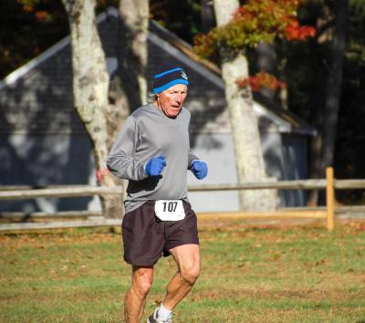 Don Cuddy races to the finish line.