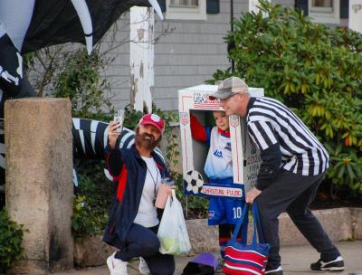 Decorations adorned houses all over Mattapoisett. This group takes a quick selfie in their soccer-themed costumes.