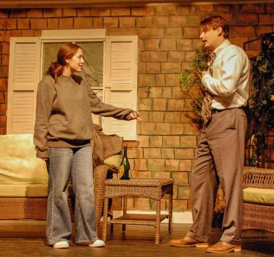 Jade Beauregard (Catherine) and Oliver Asker (Hal) converse on the porch where every scene takes place.