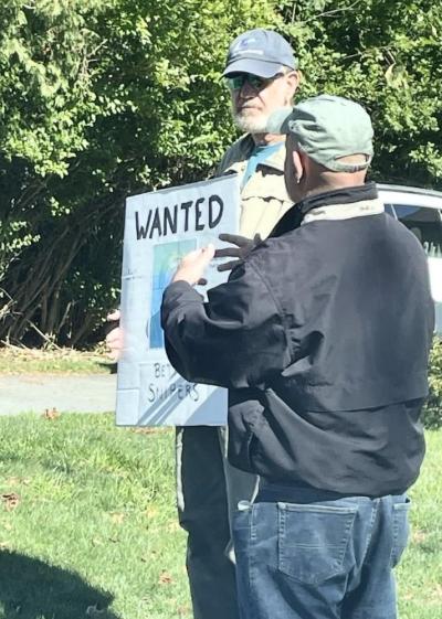 The protestor was photographed at the intersection of U.S. Route 6 and North Street and Shipyard Park. The protestor was seen at the intersection of U.S. Route 6 and North Street and Shipyard Park.
