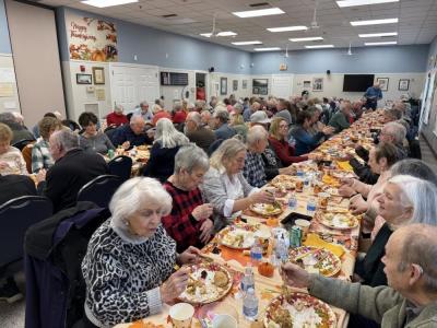 Aging residents attended a free Thanksgiving luncheon put on by Old Colony students. 