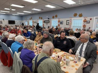 The room was packed with happy attendees.