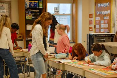 Caroline Gallagher sees where she can help the elementary schoolers out.