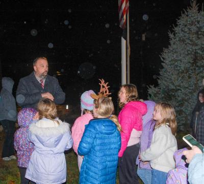 Adam Murphy tells children about the annual Christmas Tree lighting.