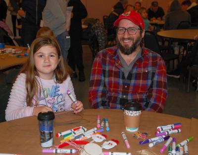 Kids and parents joined in the festivities enjoying cookies, crafts and hot coco.