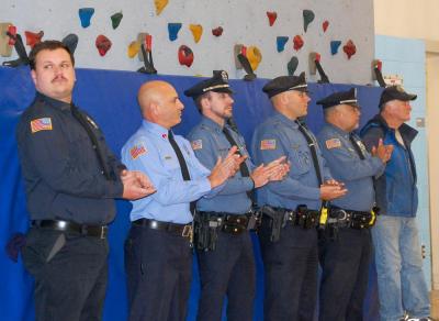 Mattapoisett Police officers applaud performances at Center School.