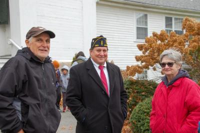 Family and friends gather together to hear the ringing of the bells.