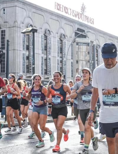 Pease running the Berlin Marathon, September 21, 2025 with her running partner, Kristen Wingate.