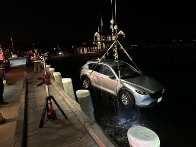 The Marion Fire Department successfully removed the car from the harbor.
