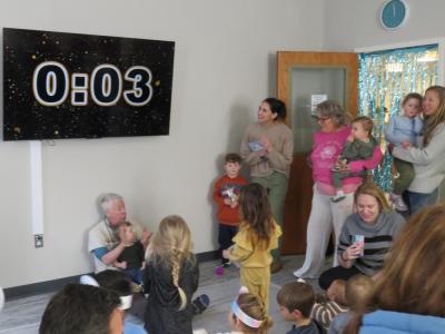 Attendees count down the seconds to noon. 