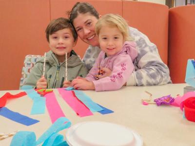 From left: Jackie Steger, center, poses with her children Will, 7, and Faye, 2. 