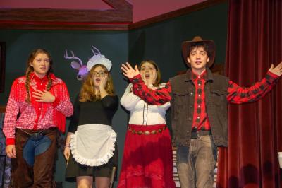 Tenley Lane, Gianna Anunziato, Amanda Tomasso and Lincoln Fauteaux are shocked at what they find on stage at a dress rehearsal of Old Rochester’s murder mystery inside a murder mystery play. Photo by Mari Huglin