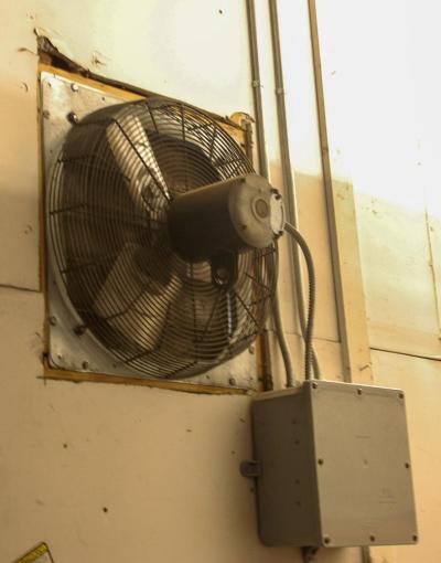 The one small fan that rids toxins and exhaust from inside the fire station.