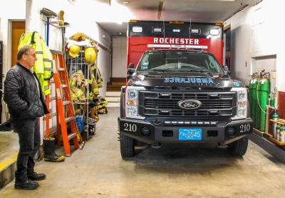 Chief Scott Weigel stands in the cramped garage.