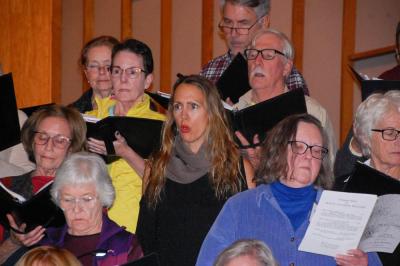 One soloist begins her song.