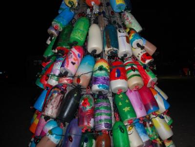 The painted buoy tree. Each buoy was painted by a summer camper.