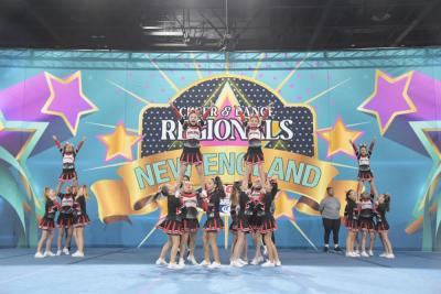 Pee Wee Cheer Team at New England Regionals. Flyers Corey Watlington, Caroline Sadek, Kylie Davignon, and Izzy Waterman.