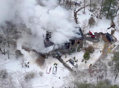 The fire was quick-moving and severely damaged the house. 