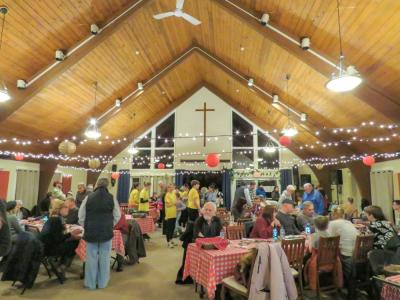 Trip participants waited on tables, sold raffle tickets and welcomed guests from the church and community at the dinner. 