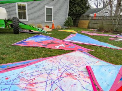 Panels for the display line the Marion Art Center's lawn. 