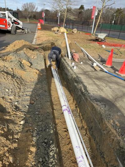 A Yard Boss employee drills irrigation well. Photo source: Old Rochester Regional School District