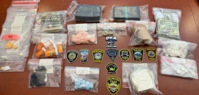 Bags of various drugs seized by investigators. Photo source: U.S. Department of Justice