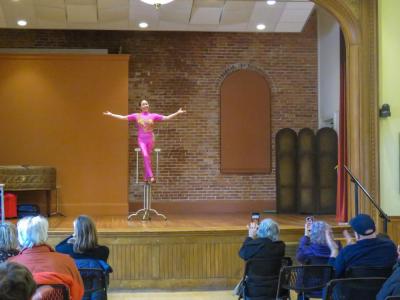 The audience cheers after Liu's performance. 