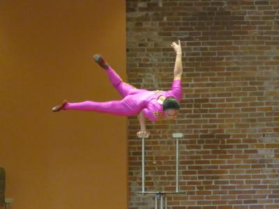 Part of Liu's act is a one-handed handstand. 