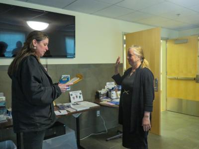 Elisabeth Horan, right, is sworn in at the Marion Police Department on Tuesday, March 31. Photo by Grace Roche