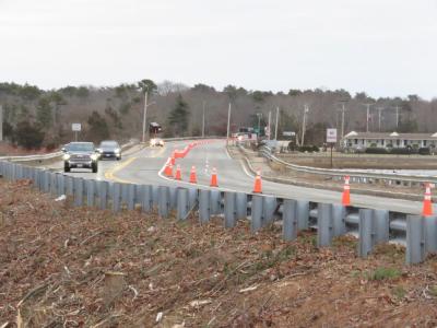 Cars travel the narrowed Route 6 bridge across the Weweantic River amidst ongoing construction. Photo by Grace Roche