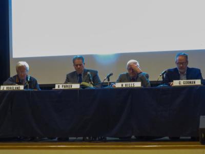 From left: Select Board members  John Hoagland, Norman Hills, Randy Parker and Town Administrator Geoffrey Gorman at the Special Town Meeting on Monday, March 23. Photo by Grace Roche