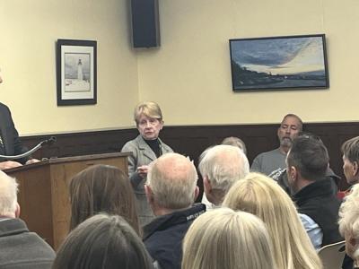 Kathy Eklund, Board of Health candidate, speaks to the audience. 