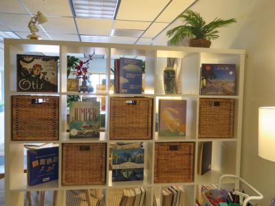 Books and other educational materials line the shelves inside the Learning Loft. 