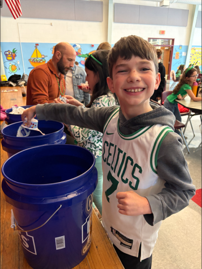 Emmet Luiz composts unwanted food at Old Hammondtown. 