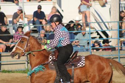 The racing stripes are on this rider instead of the flags.