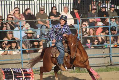 A barrel falls during this riders run.