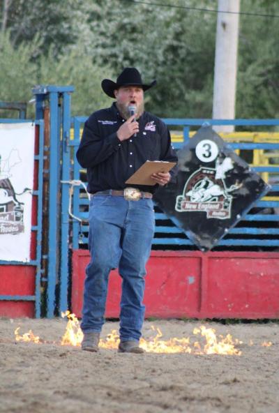 Eddie Pina announces the bull riders.