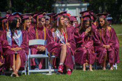 Graduates look on during the ceremony. 